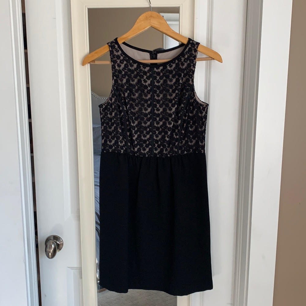 Sleeveless black embroidered mini dress